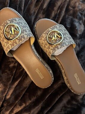 Michael Kors Brown MK Logo Slide Sandals with Gold Emblem. Size 9.5